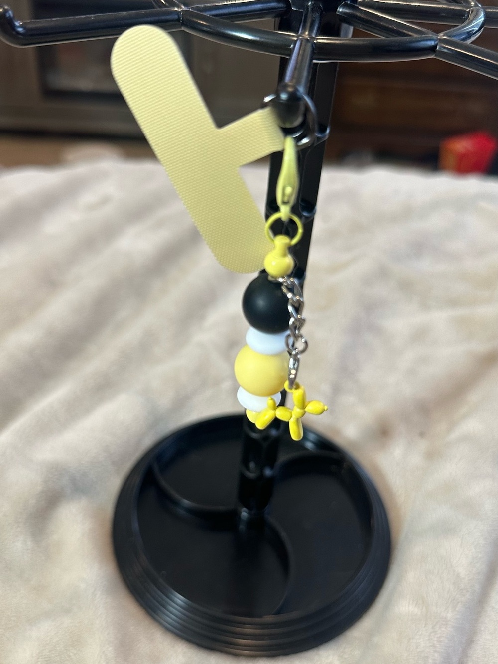 Yellow Black White Beaded phone charm with  Dangle balloon dog Charm